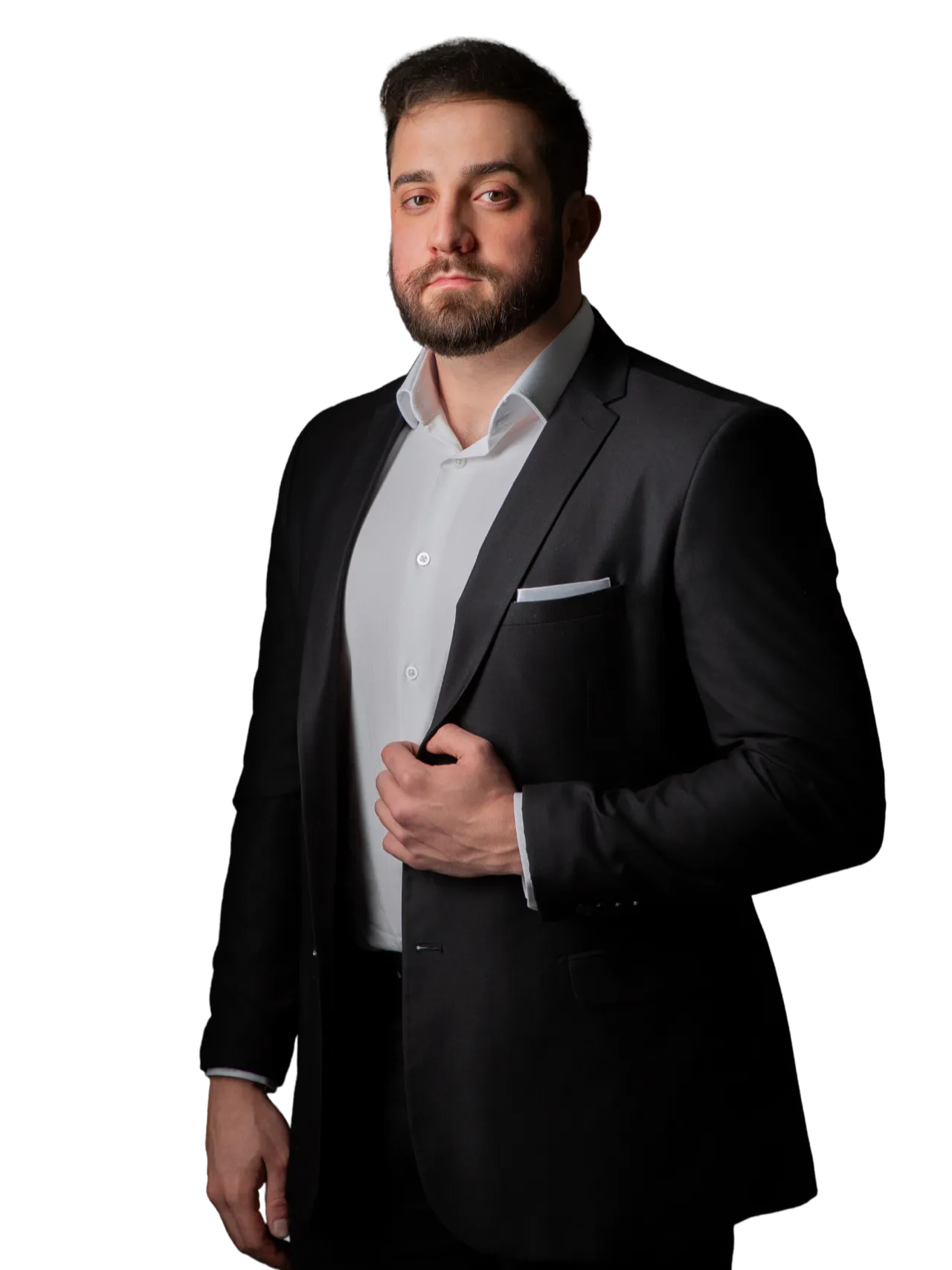 Luan Grofoski, fundador da Legado 7, de terno, em retrato profissional.